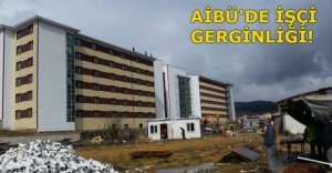 AİBÜ'DE İŞÇİLER ÇATIYA ÇIKIP EYLEM YAPTI!