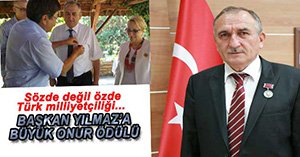 BAŞKAN YILMAZ'A BÜYÜK ONUR ÖDÜLÜ