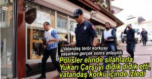 VATANDAŞLARIN ŞAŞKIN BAKIŞLARI ARASINDA...