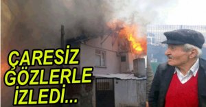 YANAN EVİNİ ÇARESİZ GÖZLERLE İZLEDİ