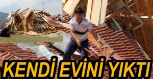 KARARA KIZDI, KENDİ EVİNİ YIKTI