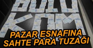 SAHTE PARAYLA PAZARCIYI DOLANDIRDILAR
