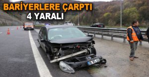 OTOMOBİL BARİYERLERE ÇARPTI 4 YARALI