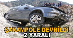 OTOMOBİL ŞARAMPOLE DEVRİLDİ 2 YARALI