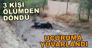 OTOMOBİL UÇURUMA YUVARLANDI, 3 YARALI