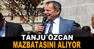 ÖZCAN MAZBATASINI ALIYOR