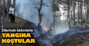 ELLERİNDE BİDONLARLA YANGINA KOŞTULAR