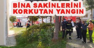 BİNA SAKİNLERİNİ KORKUTAN YANGIN