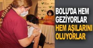 HEM GEZİYORLAR HEM AŞILARINI OLUYORLAR