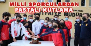 MİLLİ SPORCULARDAN İTFAİYECİLERE PASTALI KUTLAMA