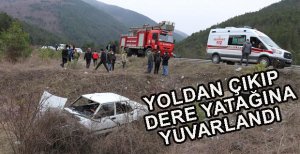 OTOMOBİL DERE YATAĞINA DEVRİLDİ