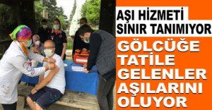 TATİLE GELENLER AŞILARINI OLUYOR
