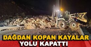 DAĞDAN KOPAN KAYALAR YOLU KAPATTI