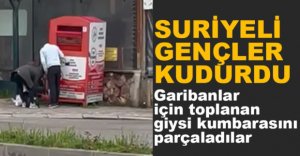 YABANCI UYRUKLULAR GİYSİ KUMBARASINI PARÇALADI