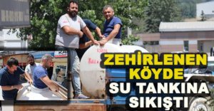 ZEHİRLENEN KÖYDE SU TANKINA SIKIŞTI