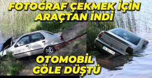 FOTOĞRAF ÇEKMEK İÇİN İNDİ, ARACI GÖLE DÜŞTÜ