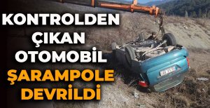 KONTROLDEN ÇIKAN OTOMOBİL ŞARAMPOLE DEVRİLDİ