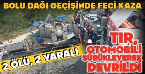 BOLU DAĞI GEÇİŞİ'NDE FECİ KAZA... TIR,  OTOMOBİLİ  SÜRÜKLEYEREK DEVRİLDİ.... 2 ÖLÜ, 2 YARALI