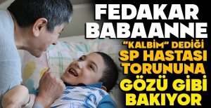 FEDAKAR BABAANNE "KALBİM" DEDİĞİ SP HASTASI TORUNUNA GÖZÜ GİBİ BAKIYOR