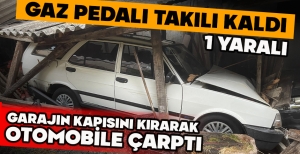 GAZ PEDALI TAKILI KALDI...GARAJIN KAPISINI KIRARAK  OTOMOBİLE ÇARPTI: 1 YARALI