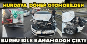 HURDAYA  DÖNEN OTOMOBİLDEN BURNU BİLE KANAMADAN ÇIKTI