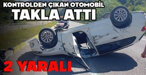 KONTROLDEN ÇIKAN OTOMOBİL TAKLA ATTI: 2 YARALI