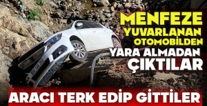 MENFEZE YUVARLANAN OTOMOBİLDEN YARA ALMADAN ÇIKTILAR, ARACI TERK EDİP GİTTİLER