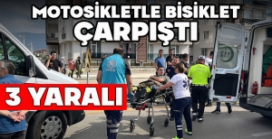 MOTOSİKLETLE BİSİKLET ÇARPIŞTI: 3 YARALI