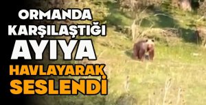 ORMANDA  KARŞILAŞTIĞI AYIYA  HAVLAYARAK  SESLENDİ