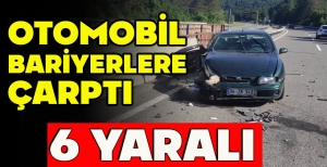 OTOMOBİL BARİYERLERE ÇARPTI: 6 YARALI