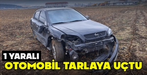 OTOMOBİL TARLAYA UÇTU: 1 YARALI