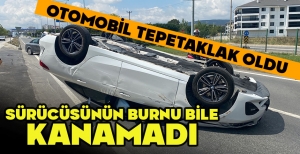 OTOMOBİL TEPETAKLAK OLDU... SÜRÜCÜSÜNÜN BURNU BİLE KANAMADI