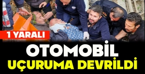 OTOMOBİL UÇURUMA DEVRİLDİ: 1 YARALI