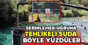 SERİNLEMEK UĞRUNA TEHLİKELİ SUDA BÖYLE YÜZDÜLER