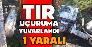 TIR UÇURUMA YUVARLANDI: 1 YARALI