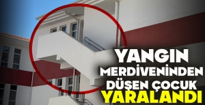 YANGIN MERDİVENİNDEN DÜŞEN ÇOCUK YARALANDI