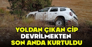 YOLDAN ÇIKAN CİP DEVRİLMEKTEN  SON ANDA KURTULDU