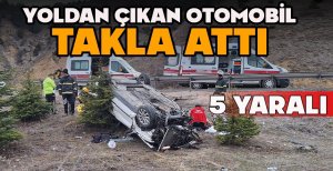 YOLDAN ÇIKAN OTOMOBİL TAKLA ATTI: 5 YARALI