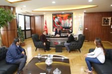 BAŞKAN ÖZCAN'A ANLAMLI ZİYARET