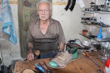 “ÇEKİCİMİN UCUYLA HAYATA TUTUNDUM”