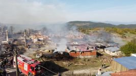 YAŞLI KADINI YANGINDAN KOMŞUSU KURTARDI