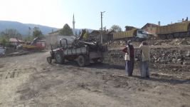 YAŞLI KADINI YANGINDAN KOMŞUSU KURTARDI