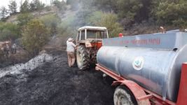 ORMAN YANGININDA KÖYLÜLERİN ERKEN MÜDAHALESİ...