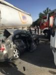 MİDİBÜS VE KAMYONUN ARASINDA OTOMOBİL KAĞIT GİBİ EZİLDİ: 1 YARALI