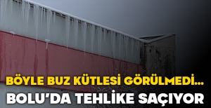 BÖYLE BUZ KÜTLESİ GÖRÜLMEDİ... BOLU'DA TEHLİKE SAÇIYOR...