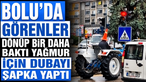 BOLU'DA GÖRENLER DÖNÜP BİR DAHA BAKTI YAĞMUR İÇİN DUBAYI ŞAPKA YAPTI