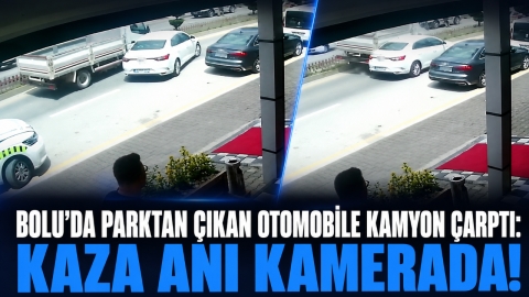 BOLU'DA PARKTAN ÇIKAN OTOMOBİLE KAMYON ÇARPTI: KAZA ANI KAMERADA!