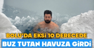BOLU'DA EKSİ 10 DERECEDE BUZ TUTAN HAVUZA GİRDİ