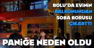 BOLU'DA EVİNİN BALKONUNDAN SOBA BORUSU ÇIKARTTI.... PANİĞE NEDEN OLDU...