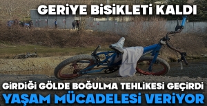GİRDİĞİ GÖLDE BOĞULMA TEHLİKESİ GEÇİRDİ...YAŞAM MÜCADELESİ VERİYOR...GERİYE BİSİKLETİ KALDI...